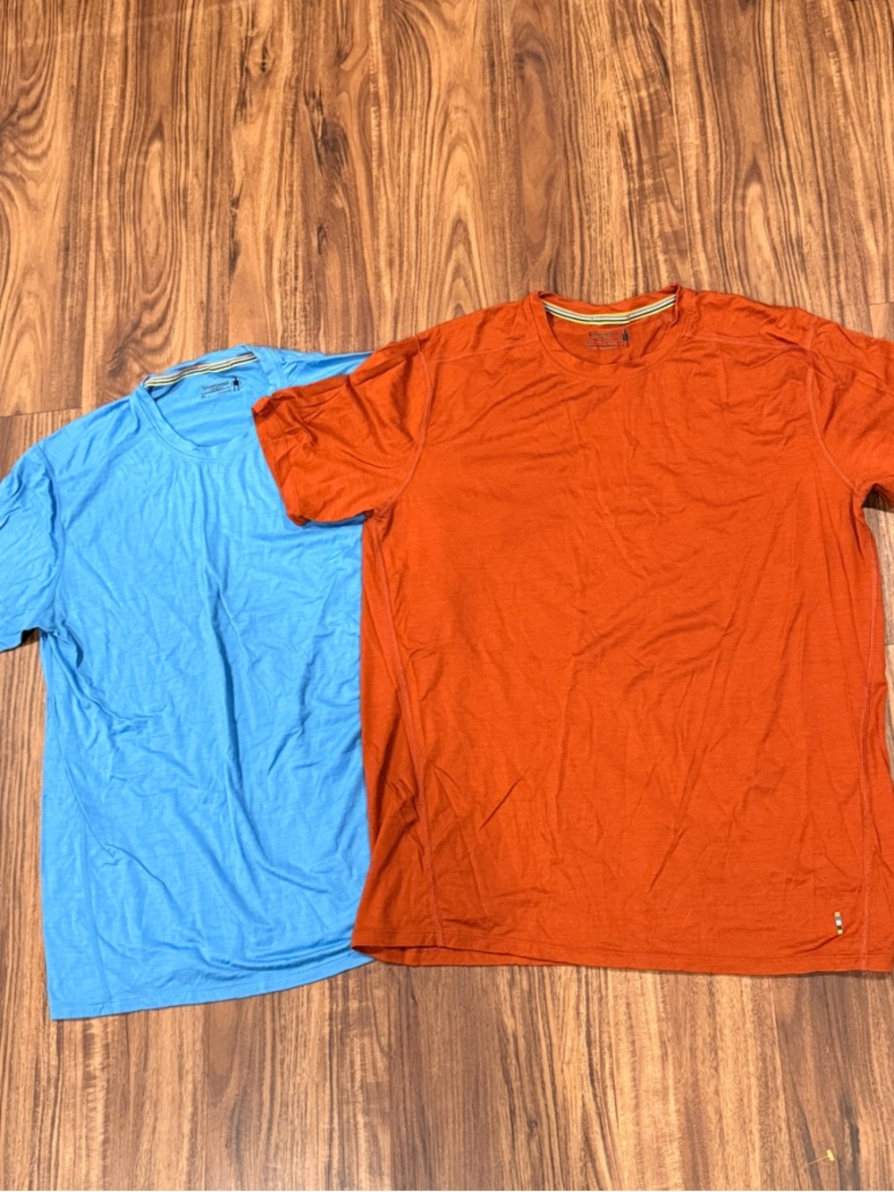 Smartwool lot of 2 orange & blue merino
150 wool t-shirts Size XL Men's